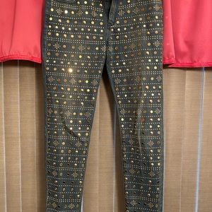 Michael Kors gold studded blue jeans